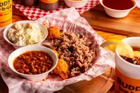 pulled pork dinner with sides and drink
